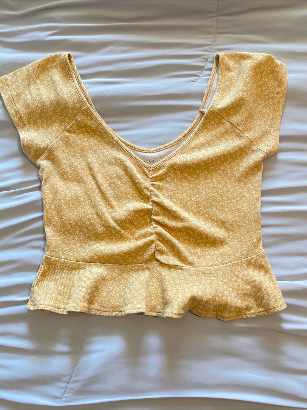 American Eagle Yellow Ruched Peplum Top
